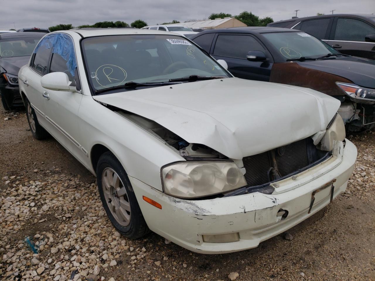 KIA OPTIMA MAG 2001 with VIN KNAGD124315097530 - Photo from auction