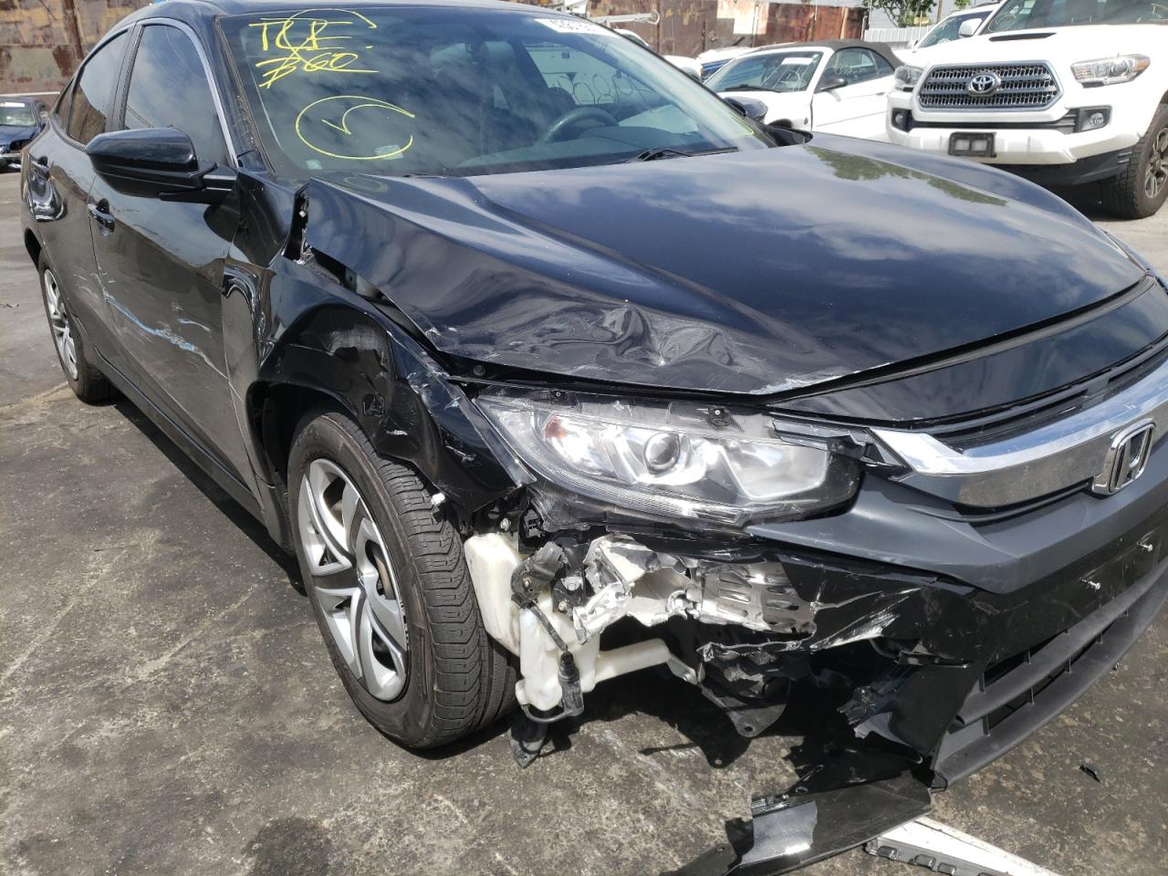 Photo 9 from auction – 2017 HONDA CIVIC LX with VIN 2HGFC2F54HH553887