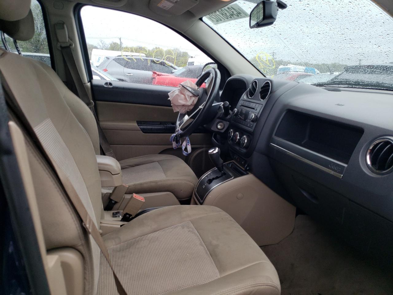 Photo 5 from auction – 2012 JEEP COMPASS LA with VIN 1C4NJDEB7CD603514