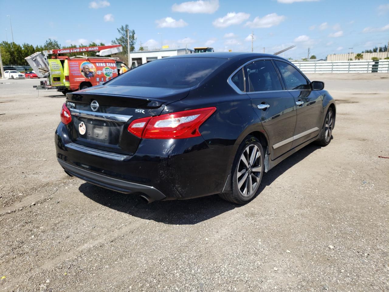 Photo 4 from auction – 2016 NISSAN ALTIMA 2.5 with VIN 1N4AL3APXGC285121