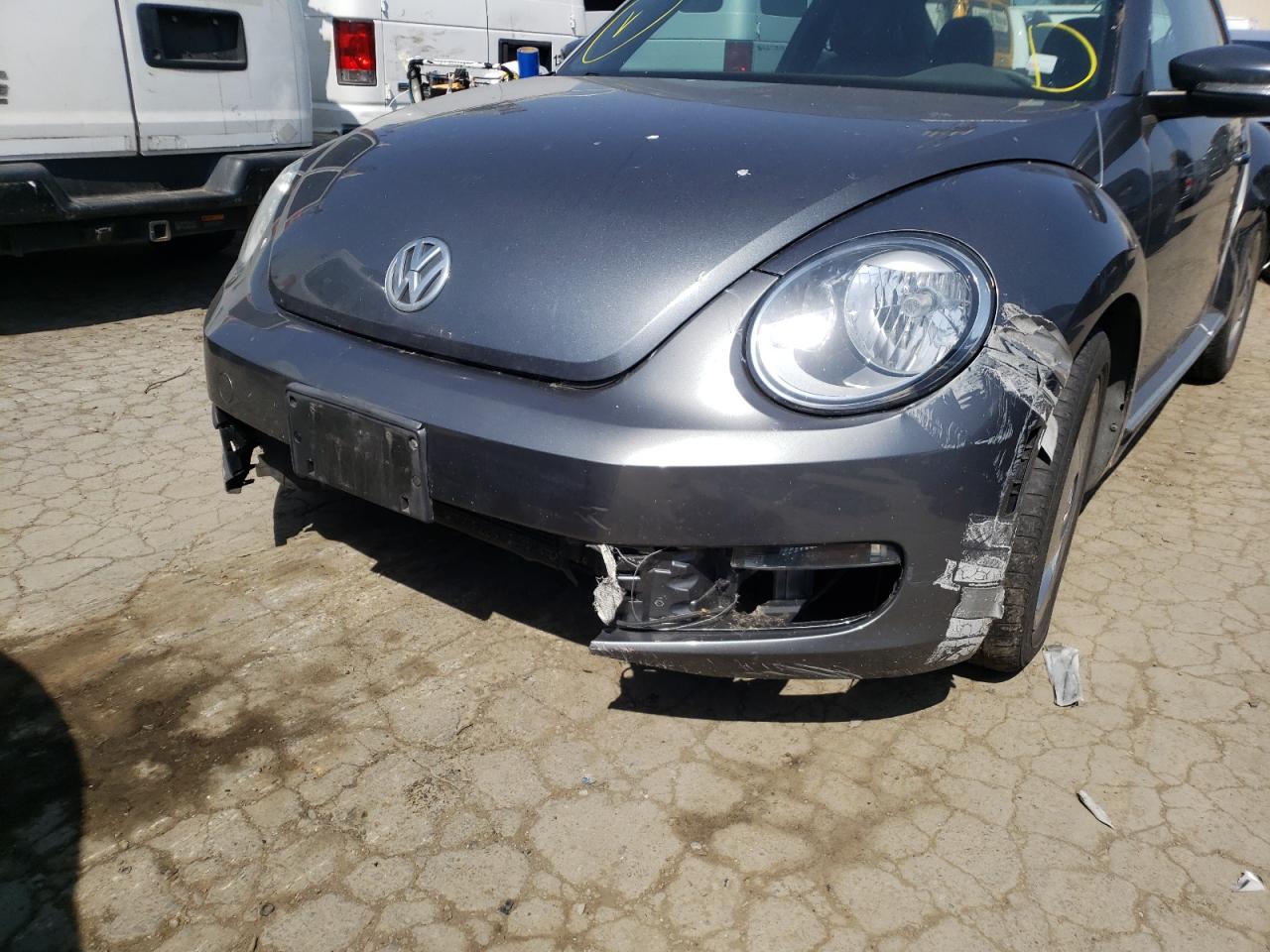 Photo 9 from auction – 2012 VOLKSWAGEN BEETLE with VIN 3VWJP7AT7CM633255