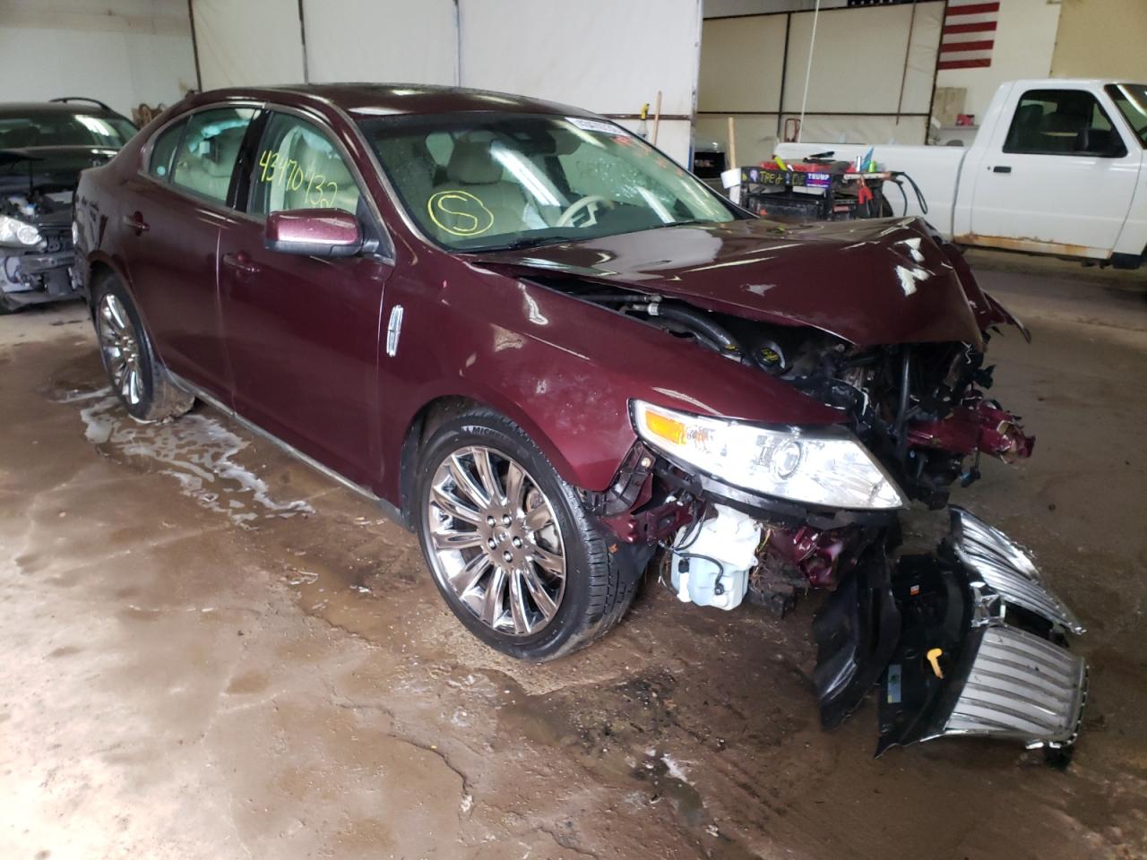 LINCOLN MKS 2011 with VIN 1LNHL9ER2BG607223 - Photo from auction