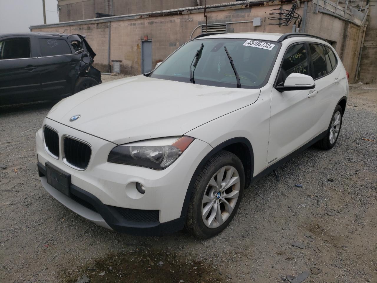 Photo 2 from auction – 2014 BMW X1 XDRIVE2 with VIN WBAVL1C58EVY22143