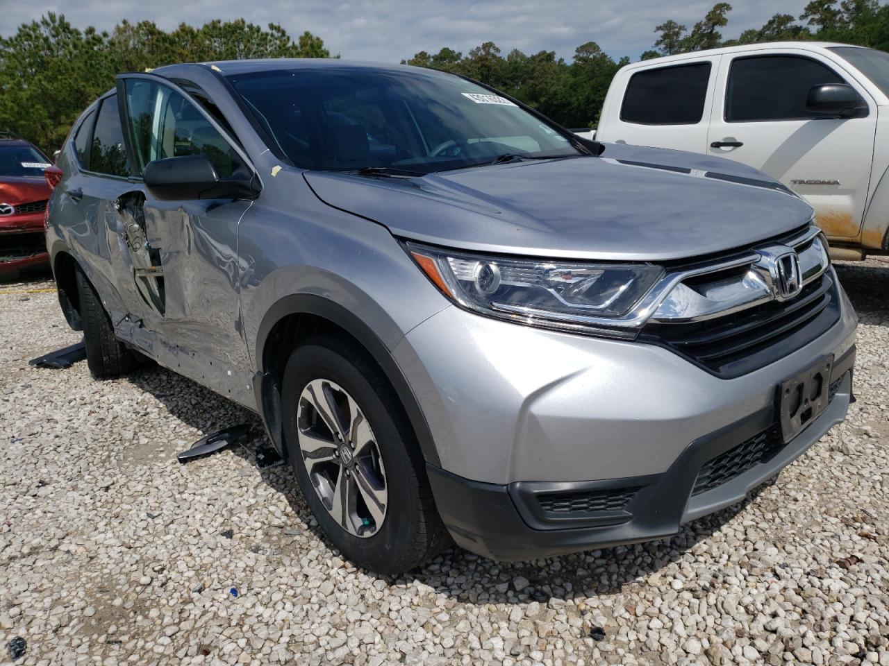 HONDA CR-V LX 2017 with VIN 7FARW5H36HE010003 - Photo from auction