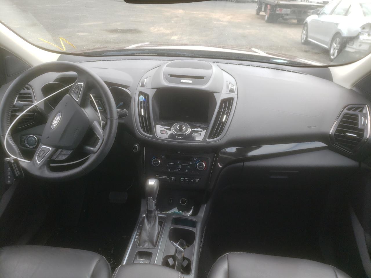 Photo 9 from auction – 2017 FORD ESCAPE TIT with VIN 1FMCU9J92HUB58147