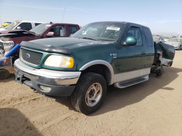 Photo 2 from auction – 2000 FORD F150 with VIN 1FTRX18LXYKA24247