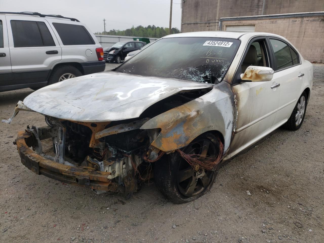 Photo 2 from auction – 2009 KIA OPTIMA LX with VIN KNAGE228395335006