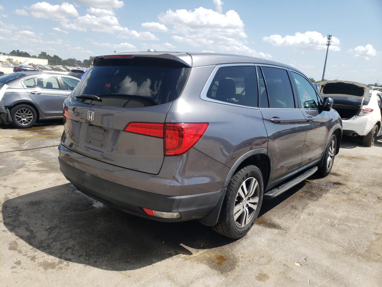 Photo 4 from auction – 2016 HONDA PILOT EXL with VIN 5FNYF5H53GB041877