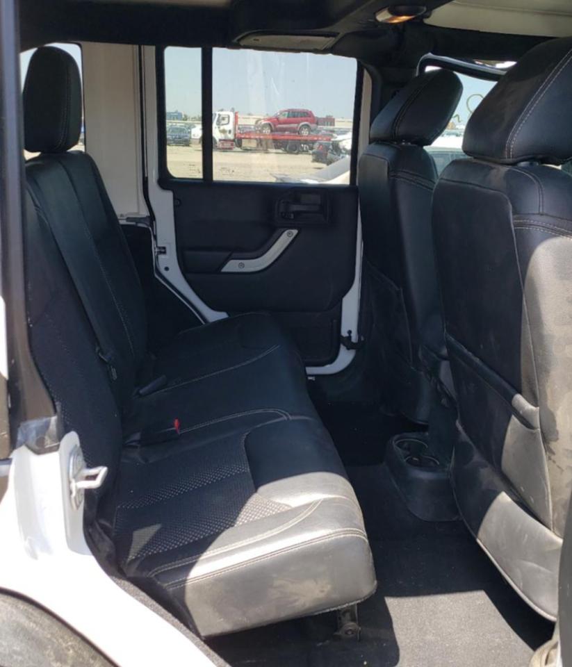 Photo 6 from auction – 2016 JEEP WRANGLER U with VIN 1C4BJWDG6GL274120