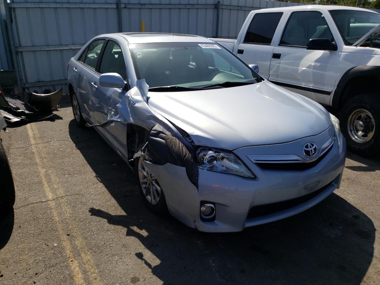 TOYOTA CAMRY HYBR 2011 with VIN 4T1BB3EK5BU127980 - Photo from auction