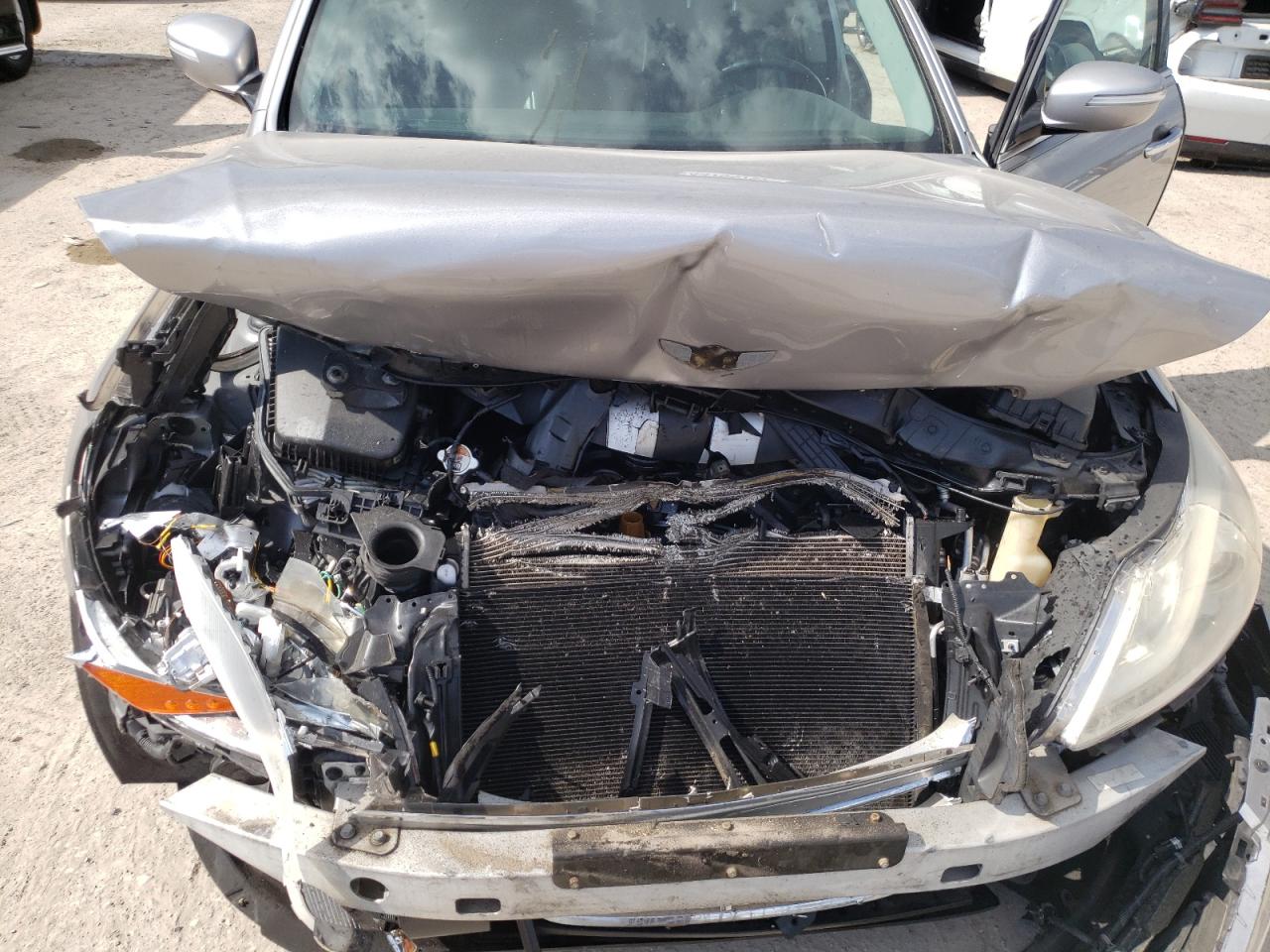 Photo 7 from auction – 2013 HYUNDAI GENESIS 3. with VIN KMHGC4DD2DU220843