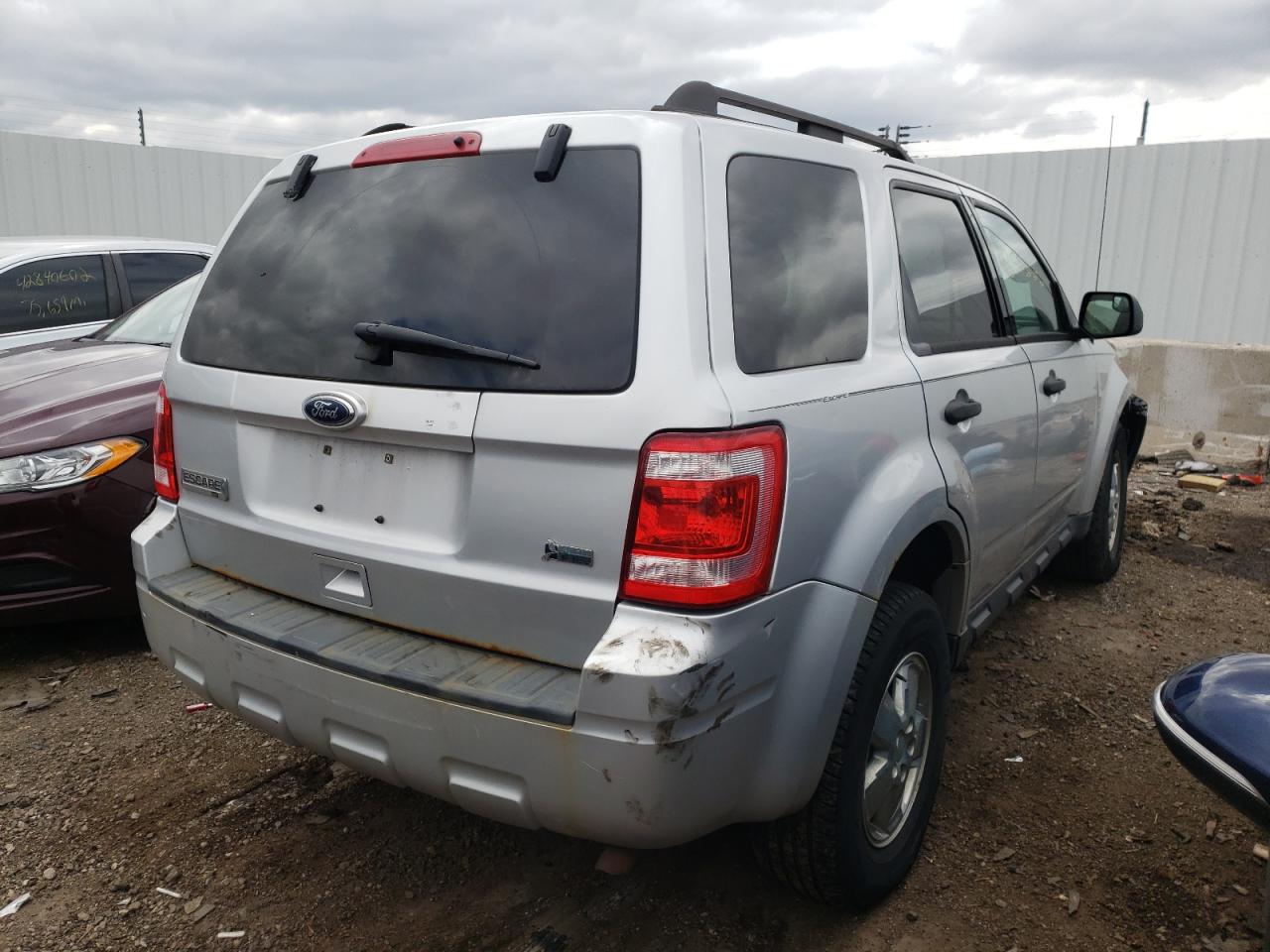 Photo 4 from auction – 2010 FORD ESCAPE XLT with VIN 1FMCU0DG8AKB01958