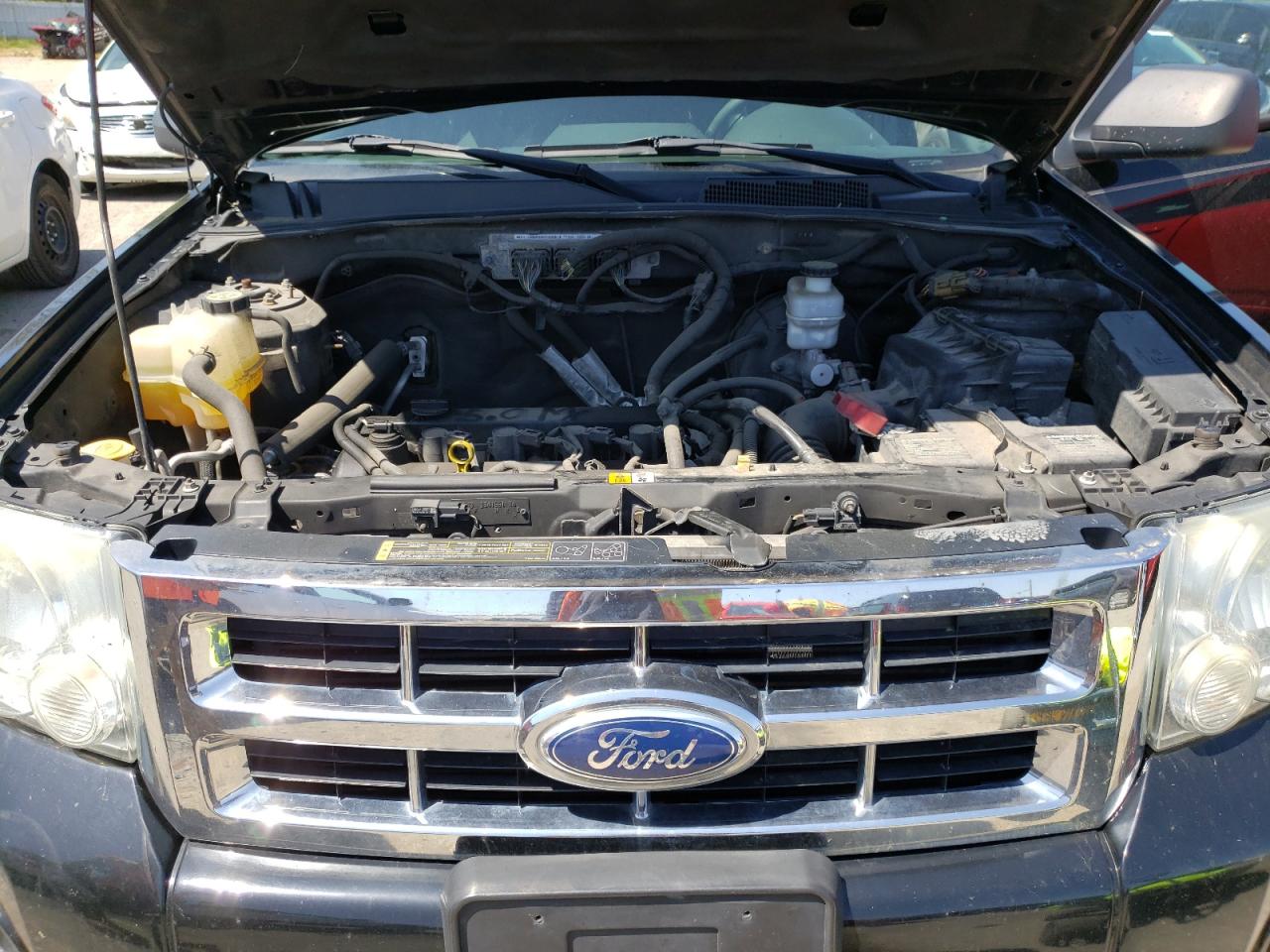 Photo 7 from auction – 2010 FORD ESCAPE XLT with VIN 1FMCU0D77AKC45727