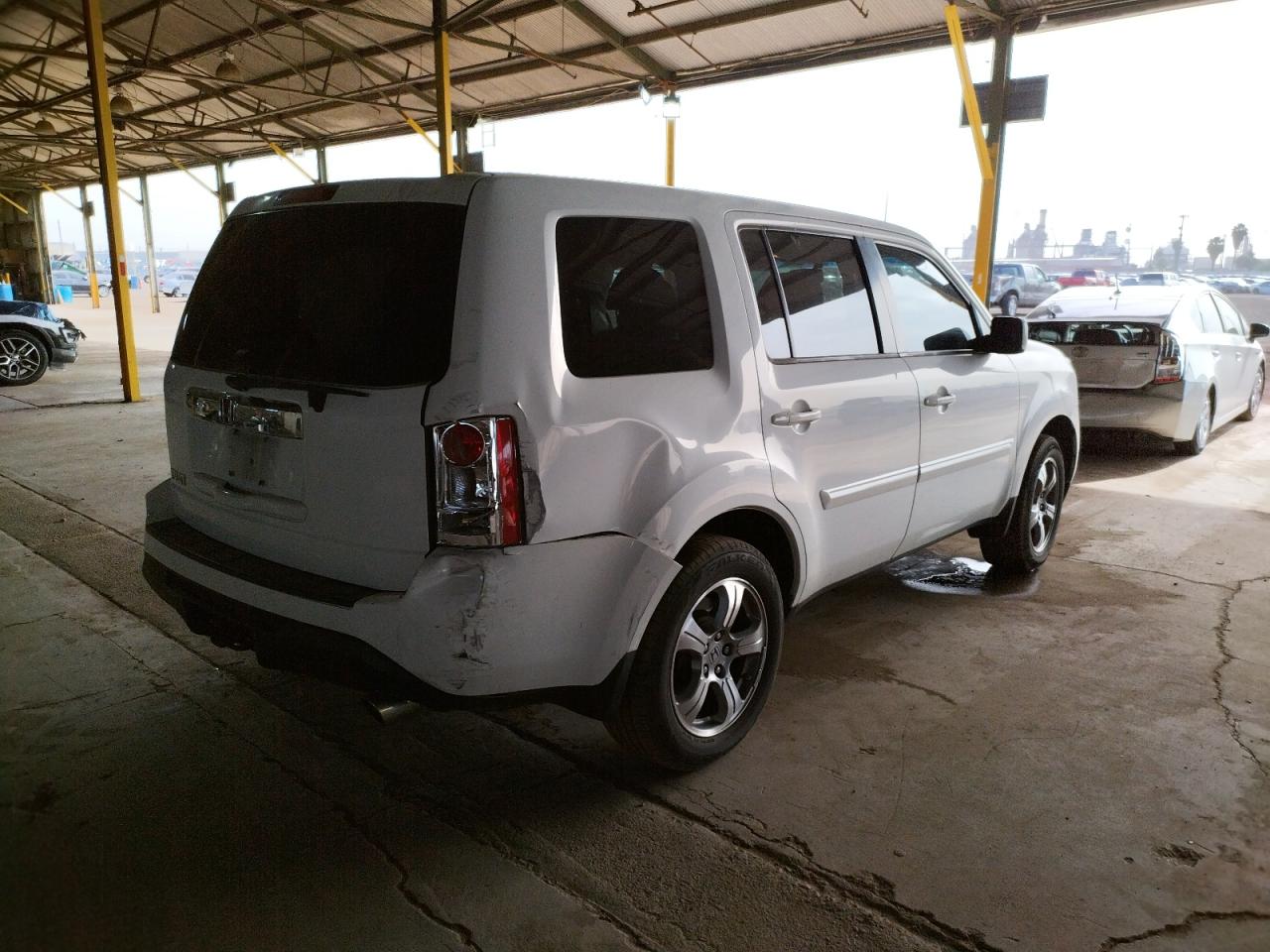 Photo 4 from auction – 2014 HONDA PILOT EXLN with VIN 5FNYF3H77EB024339