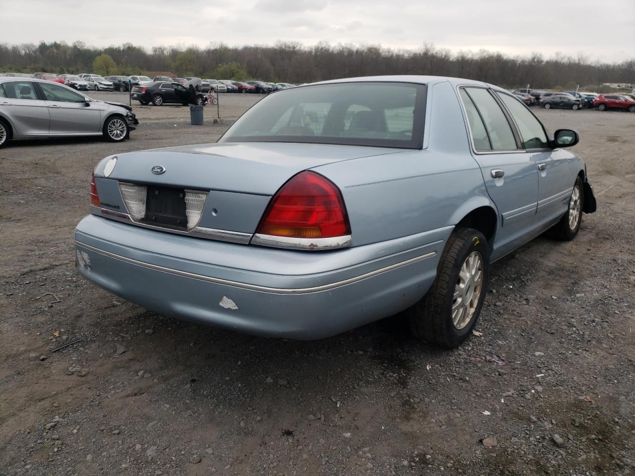 Photo 4 from auction – 2003 FORD CROWN VICT with VIN 2FAFP74W03X141479