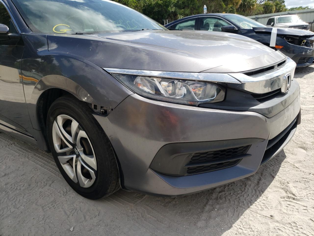 Photo 9 from auction – 2017 HONDA CIVIC LX with VIN 19XFC2F51HE050604
