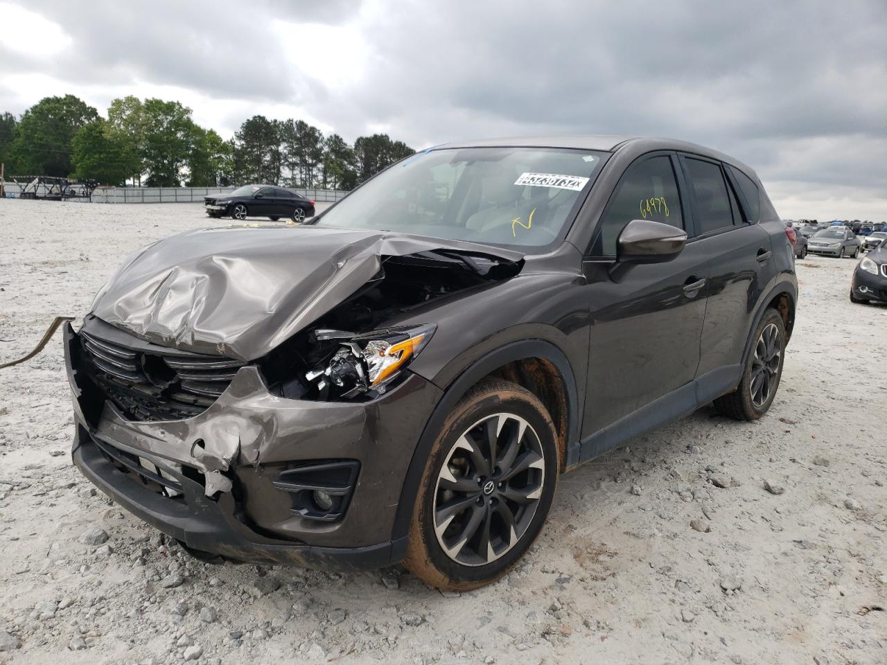 Photo 2 from auction – 2016 MAZDA CX-5 GT with VIN JM3KE2DY1G0895103