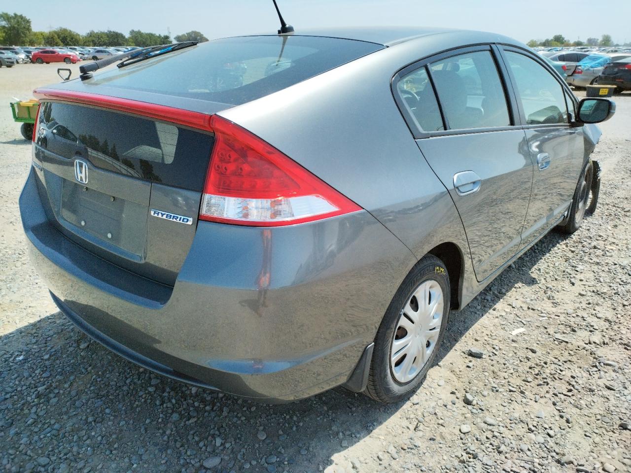 Photo 4 from auction – 2011 HONDA INSIGHT LX with VIN JHMZE2H56BS002586