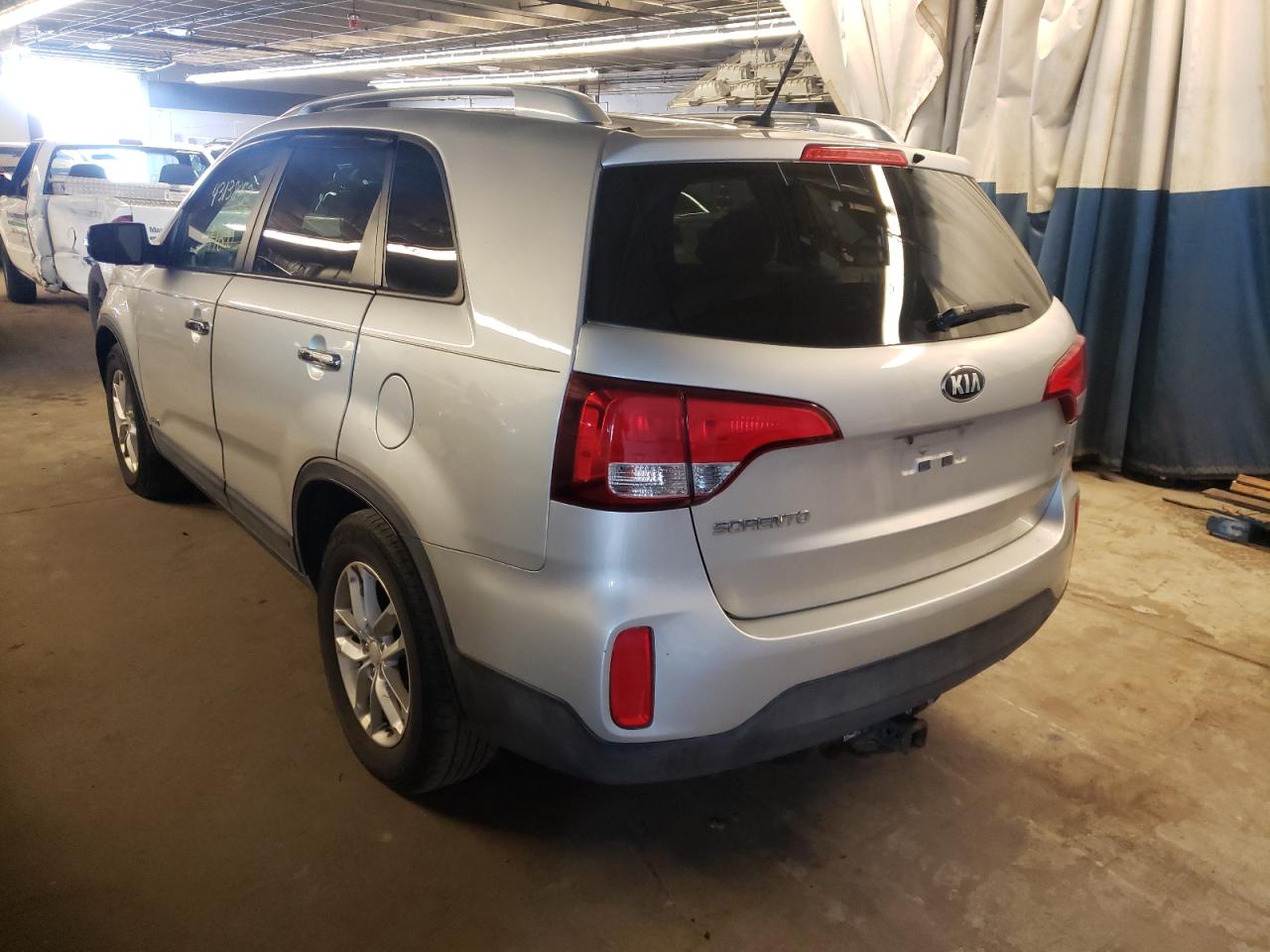 Photo 3 from auction – 2014 KIA SORENTO LX with VIN 5XYKTDA73EG462007