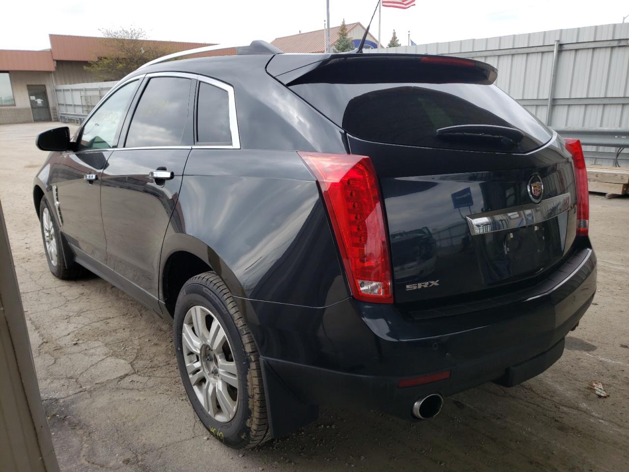 Photo 3 from auction – 2011 CADILLAC SRX LUXURY with VIN 3GYFNAEY3BS678893