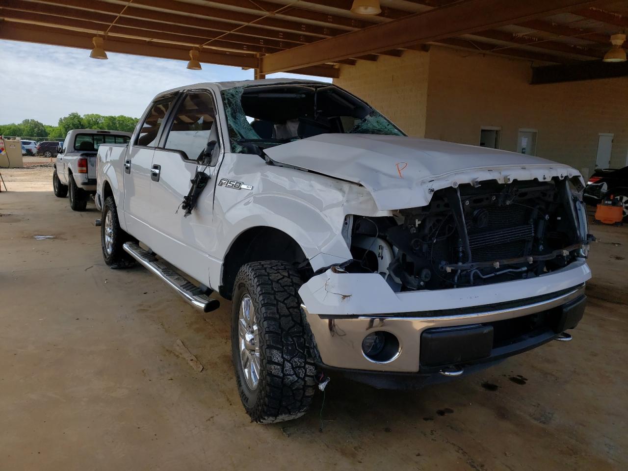 FORD F150 SUPER 2012 with VIN 1FTFW1EF8CFC87410 - Photo from auction