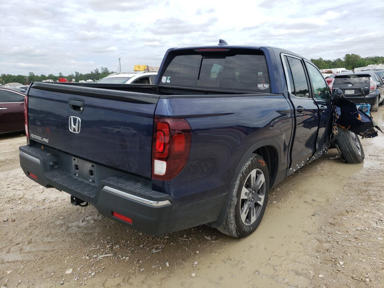 Photo 4 from auction – 2019 HONDA RIDGELINE with VIN 5FPYK2F55KB001202