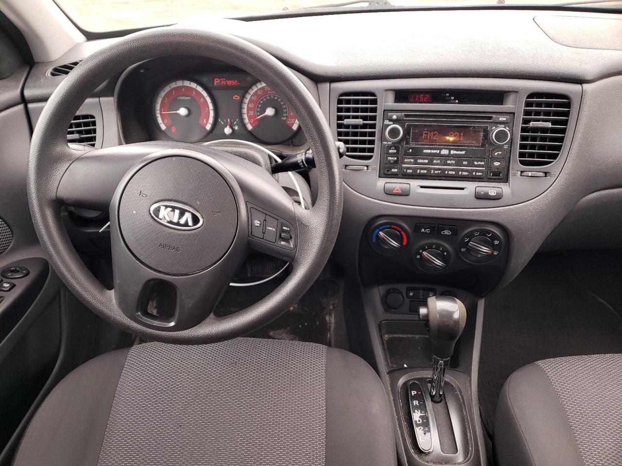 Photo 9 from auction – 2011 KIA RIO BASE with VIN KNADH4B33B6952142
