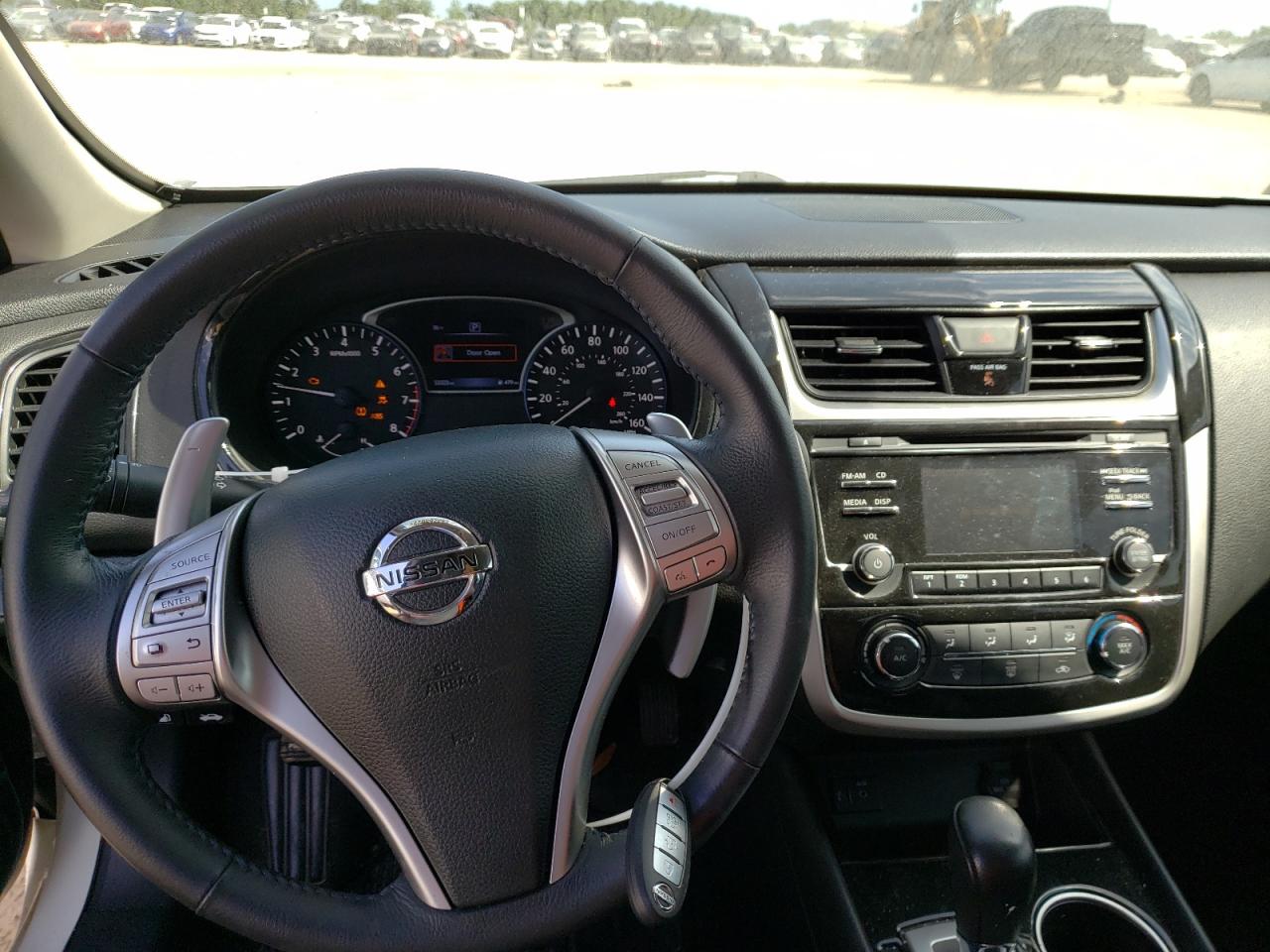 Photo 9 from auction – 2017 NISSAN ALTIMA 2.5 with VIN 1N4AL3AP1HC124223