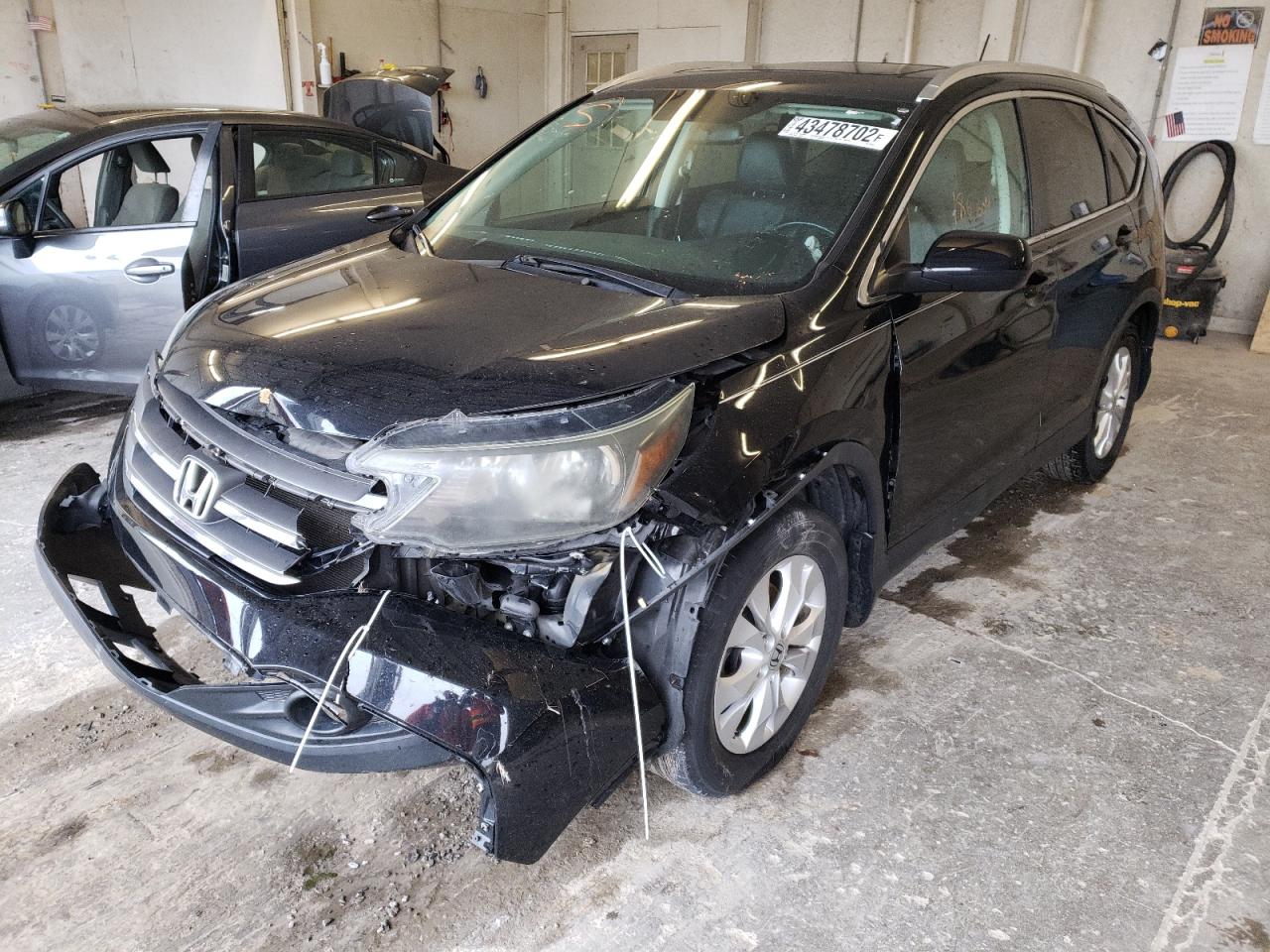 Photo 2 from auction – 2013 HONDA CR-V EXL with VIN 5J6RM3H72DL006489