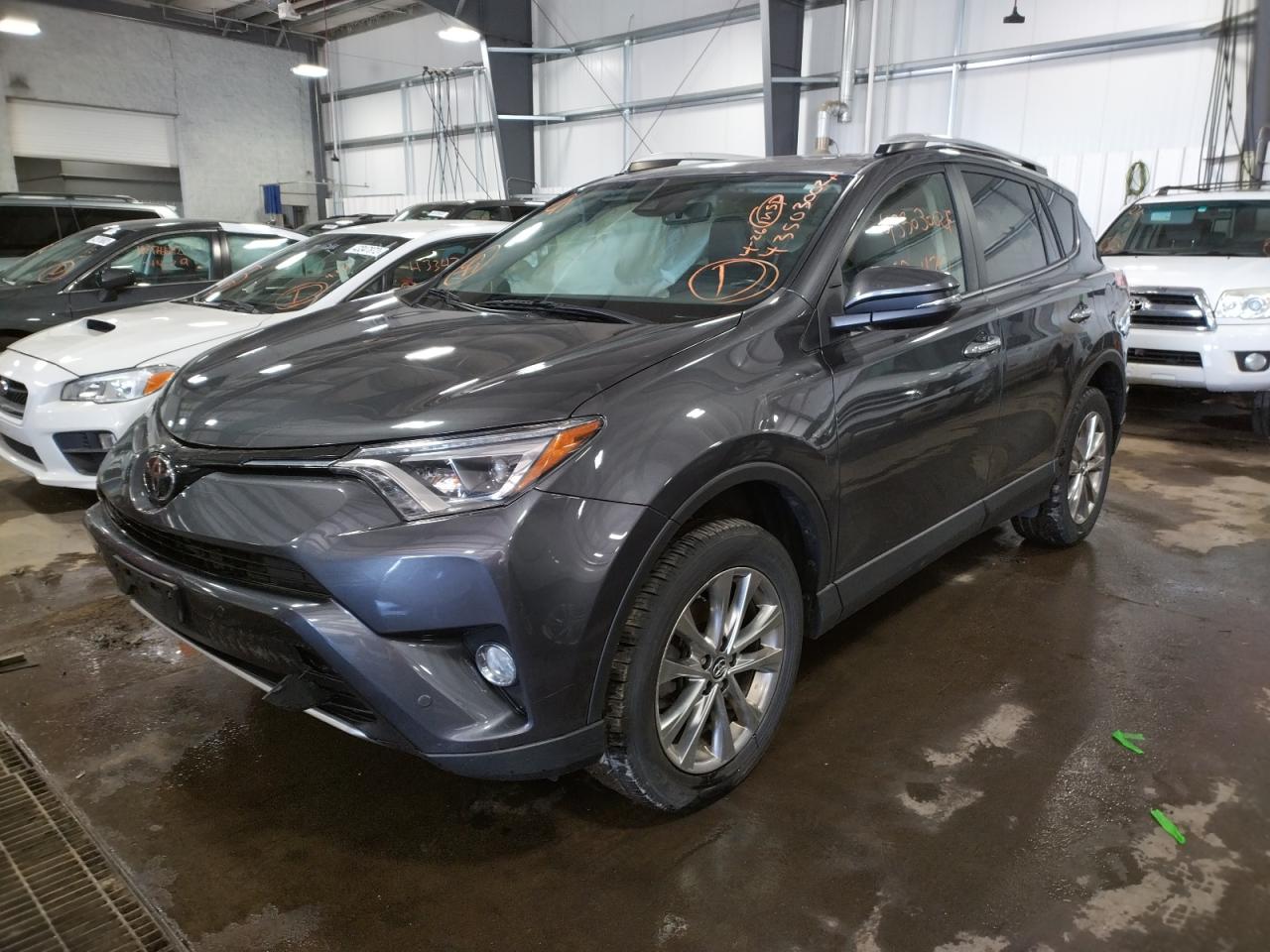 Photo 2 from auction – 2016 TOYOTA RAV4 LIMIT with VIN JTMDFREV2GJ083637