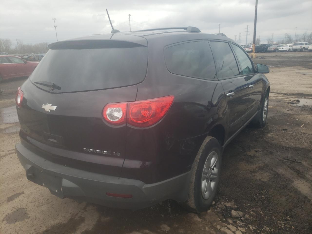 Photo 4 from auction – 2010 CHEVROLET TRAVERSE L with VIN 1GNLREED4AS154199