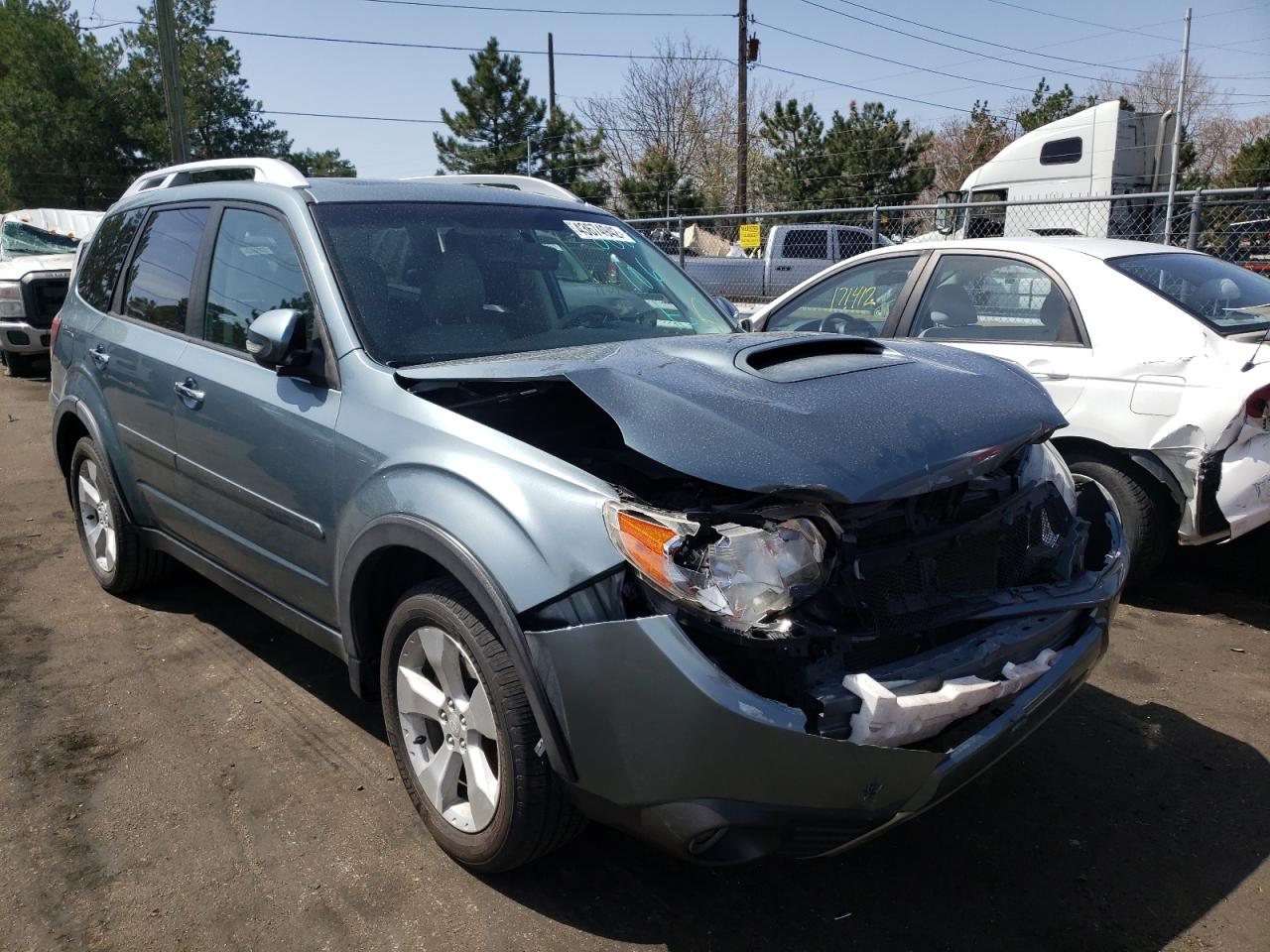 SUBARU FORESTER T 2011 with VIN JF2SHGHC0BH736225 - Photo from auction
