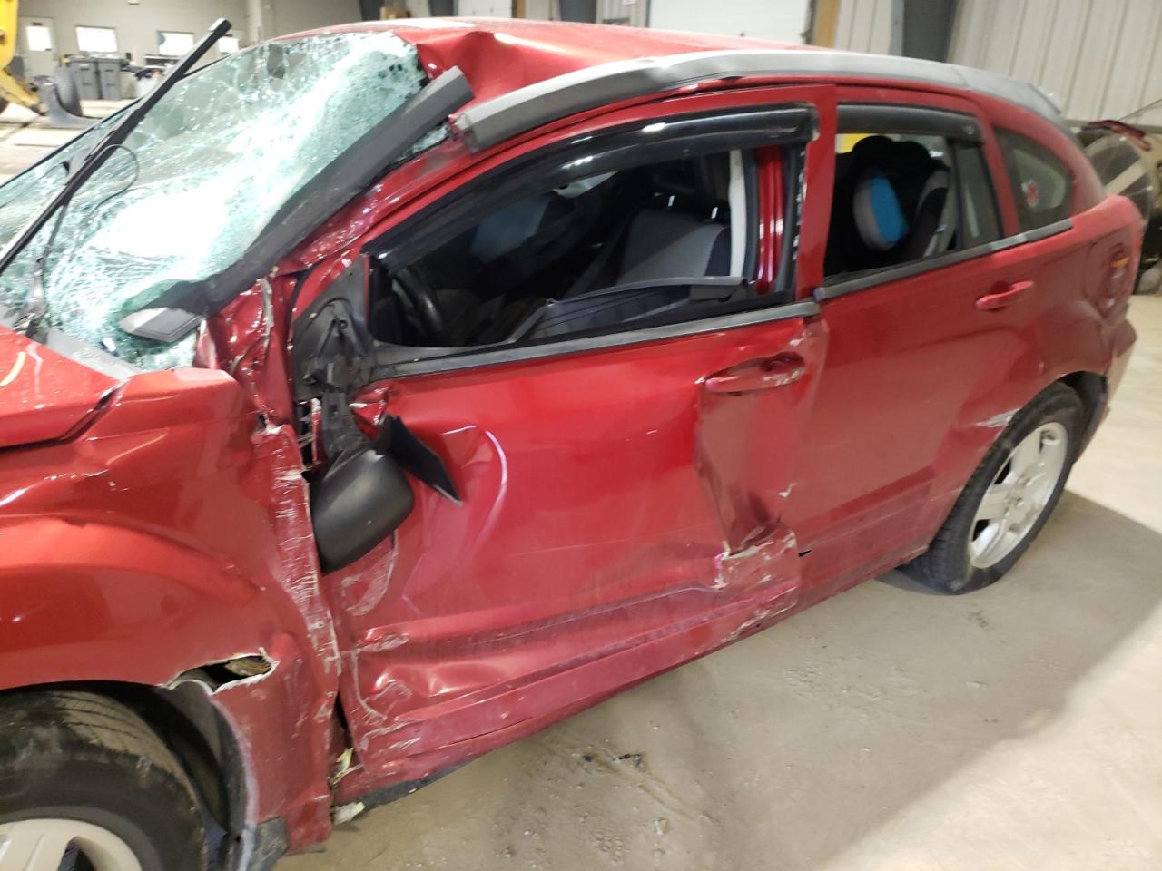 Photo 9 from auction – 2009 DODGE CALIBER SX with VIN 1B3HB48A09D198300