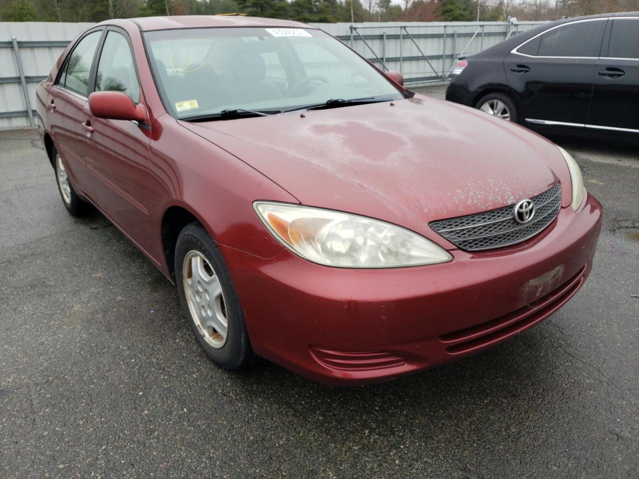 TOYOTA CAMRY LE 2002 with VIN 4T1BF32K12U021390 - Photo from auction