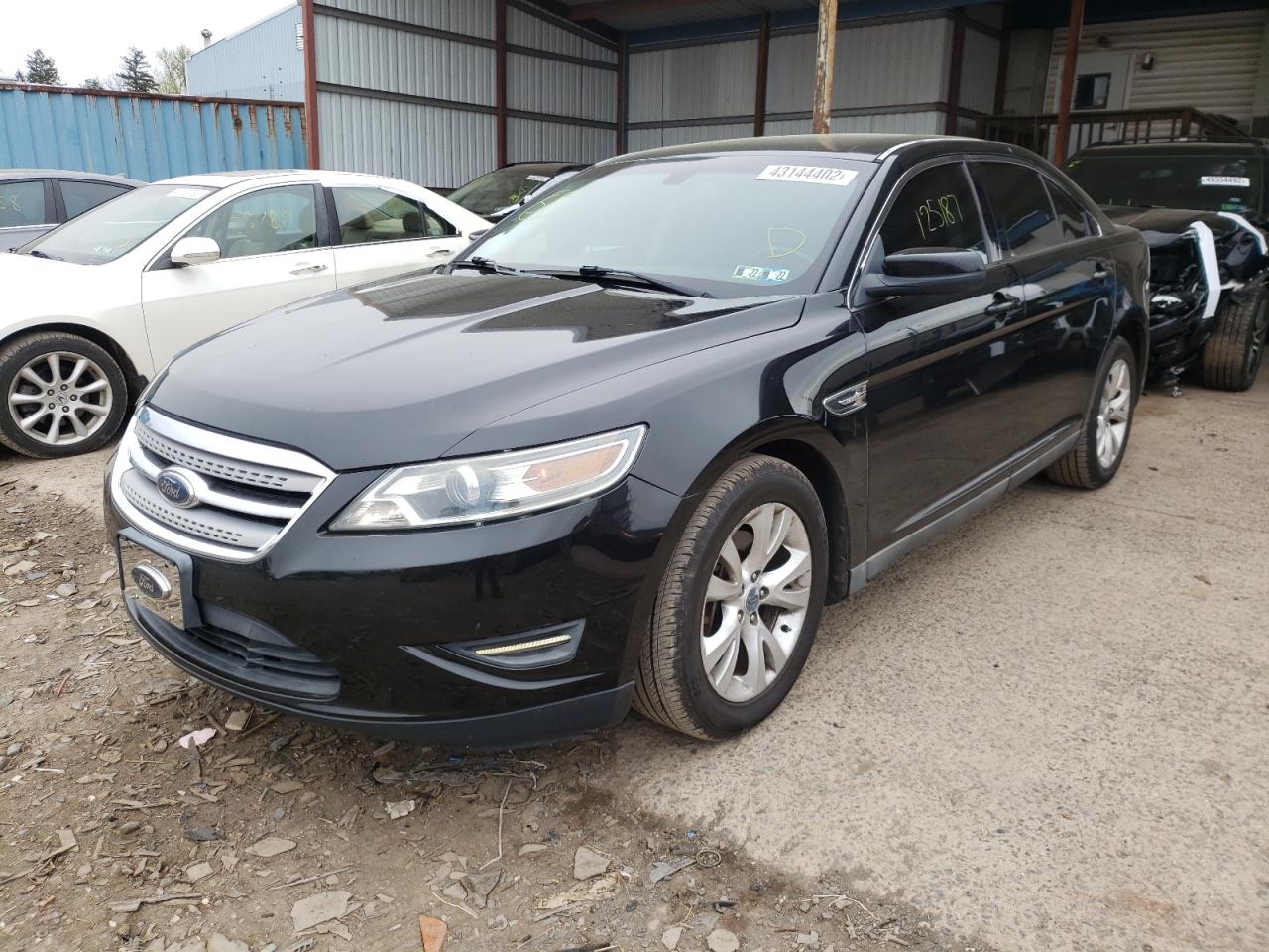 Photo 2 from auction – 2010 FORD TAURUS SEL with VIN 1FAHP2EW9AG148721