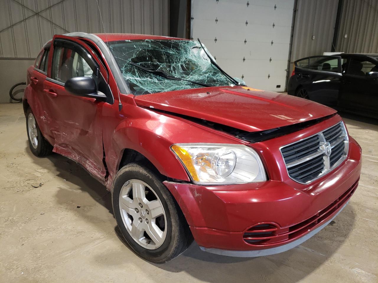 DODGE CALIBER SX 2009 with VIN 1B3HB48A09D198300 - Photo from auction