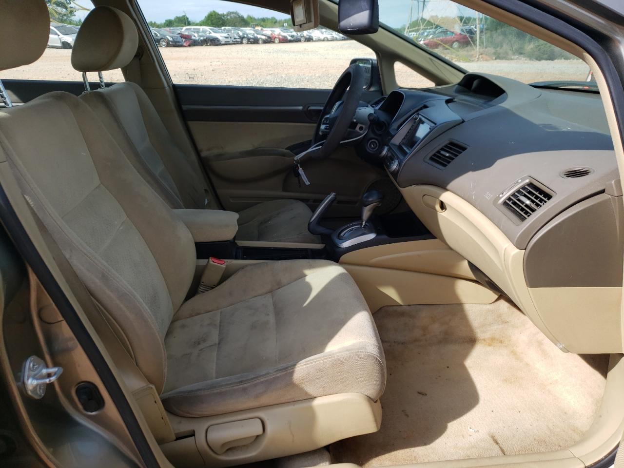 Photo 5 from auction – 2006 HONDA CIVIC HYBR with VIN JHMFA36216S007066