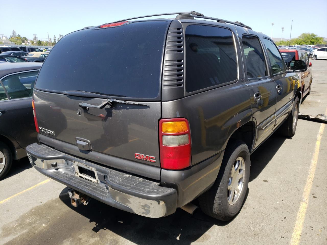 Photo 4 from auction – 2002 GMC YUKON with VIN 1GKEC13V22J277454