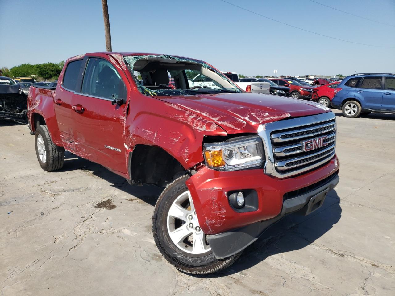 GMC CANYON SLE 2016 with VIN 1GTG5CE36G1110690 - Photo from auction