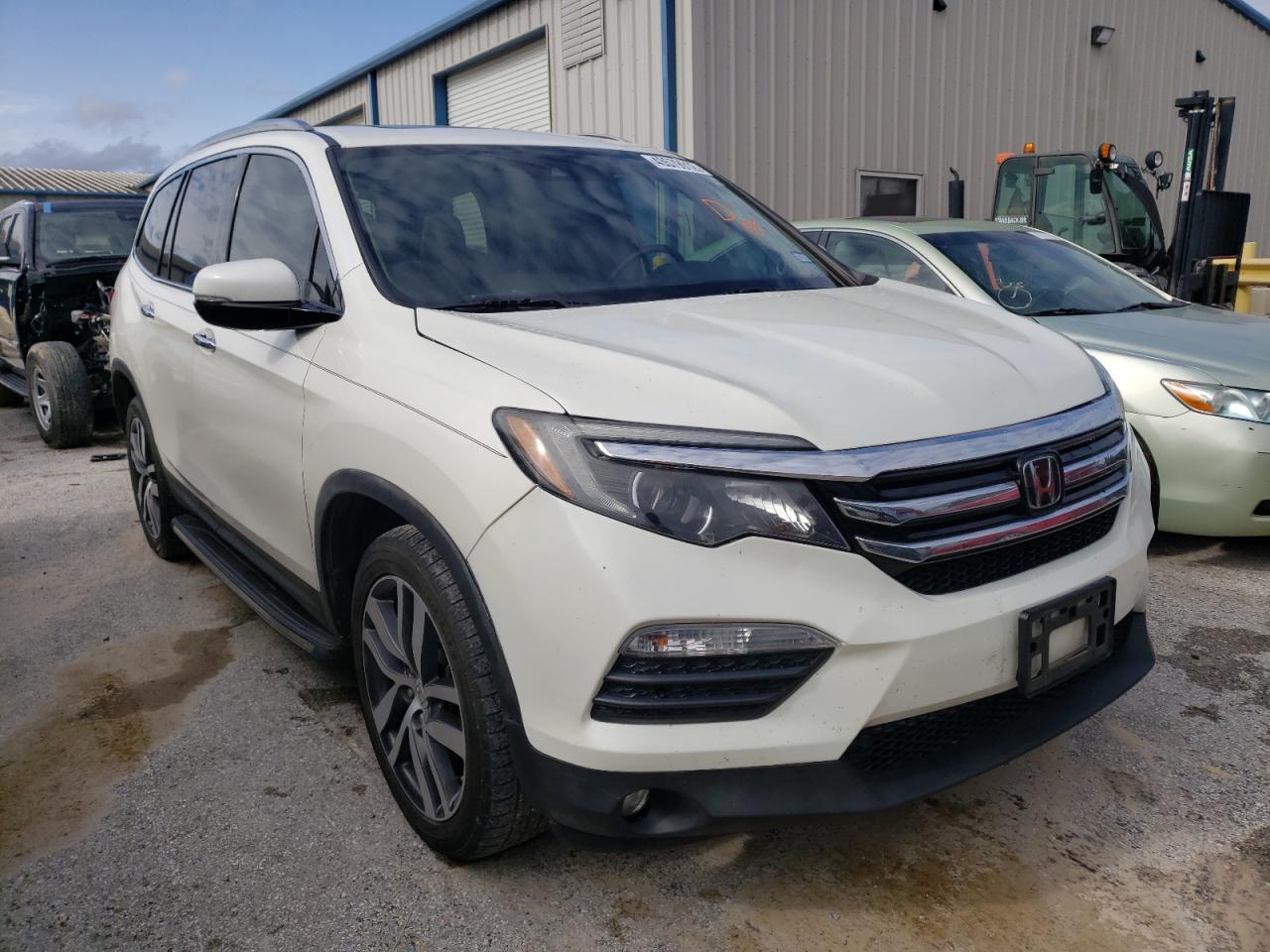 HONDA PILOT ELIT 2016 with VIN 5FNYF6H08GB116311 - Photo from auction