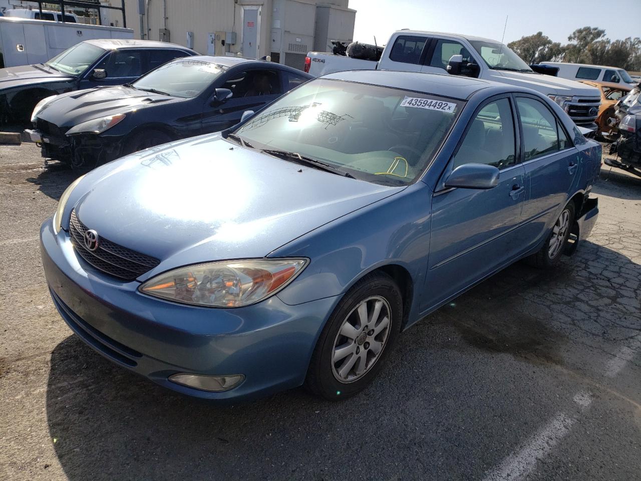 Photo 2 from auction – 2003 TOYOTA CAMRY with VIN JTDBE32K630232665