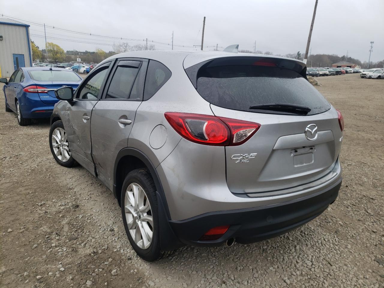 Photo 3 from auction – 2014 MAZDA CX-5 GT with VIN JM3KE4DY6E0341354