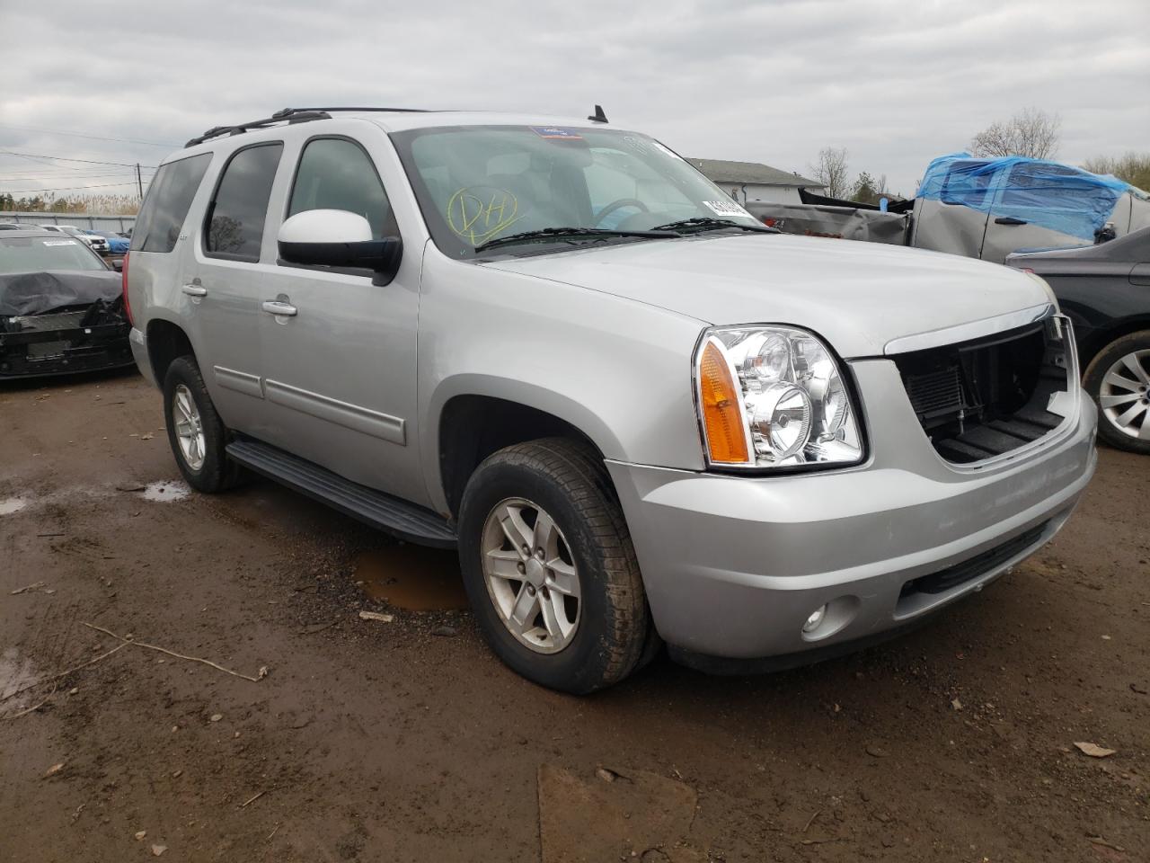 GMC YUKON SLT 2011 with VIN 1GKS2CE07BR336017 - Photo from auction