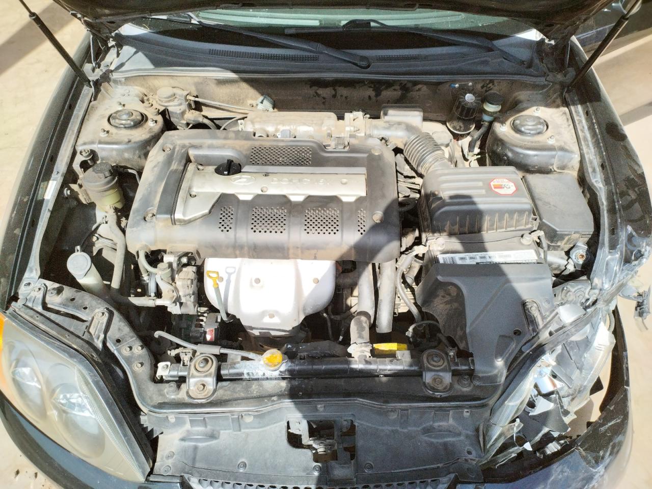 Photo 7 from auction – 2003 HYUNDAI TIBURON with VIN KMHHM65D23U036500