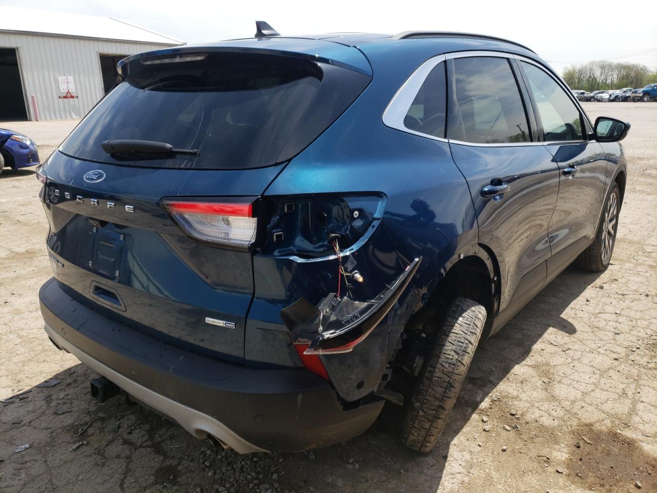 Photo 9 from auction – 2020 FORD ESCAPE TIT with VIN 1FMCU9J99LUA99400