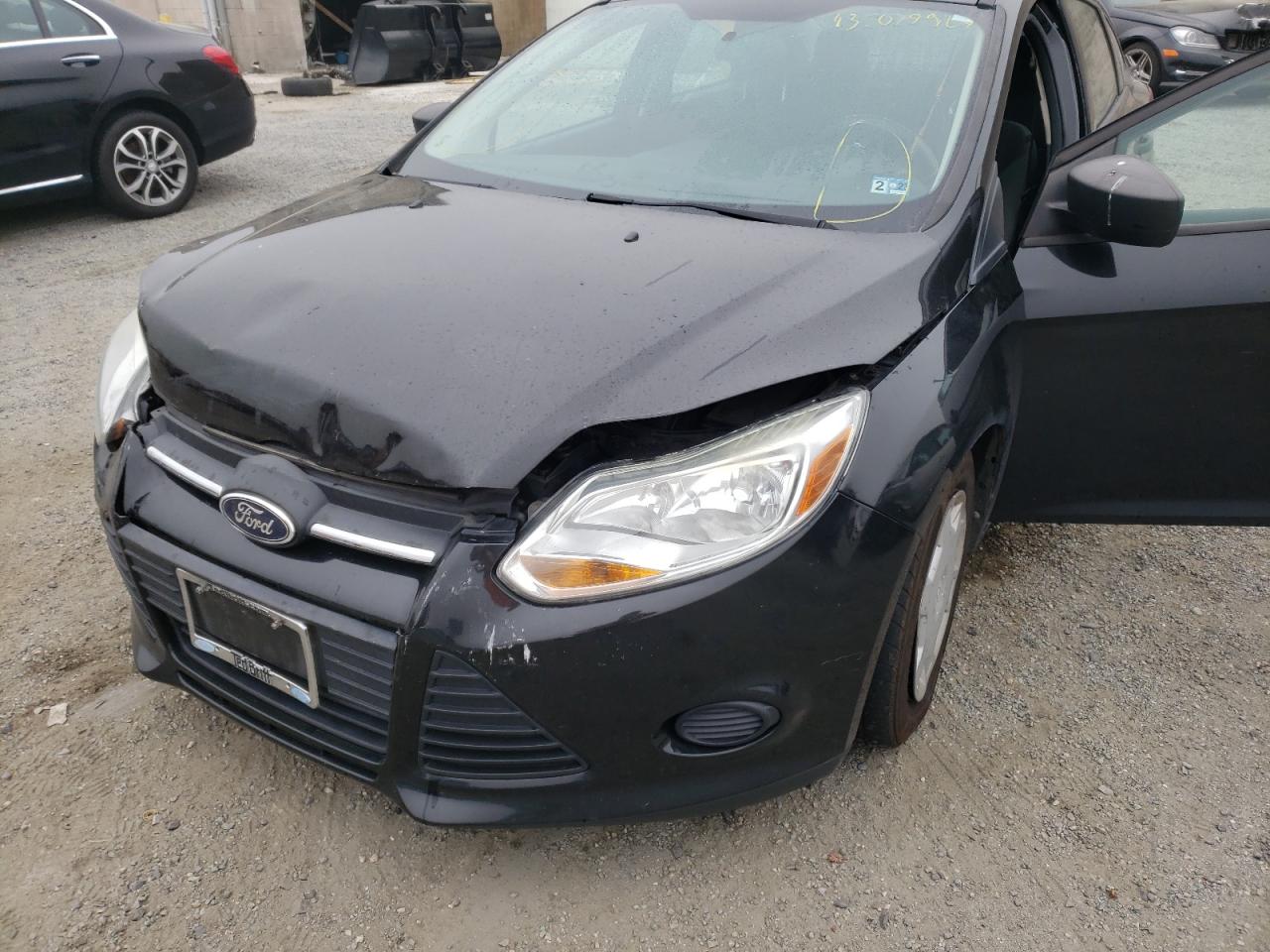 Photo 9 from auction – 2013 FORD FOCUS S with VIN 1FADP3E2XDL208017