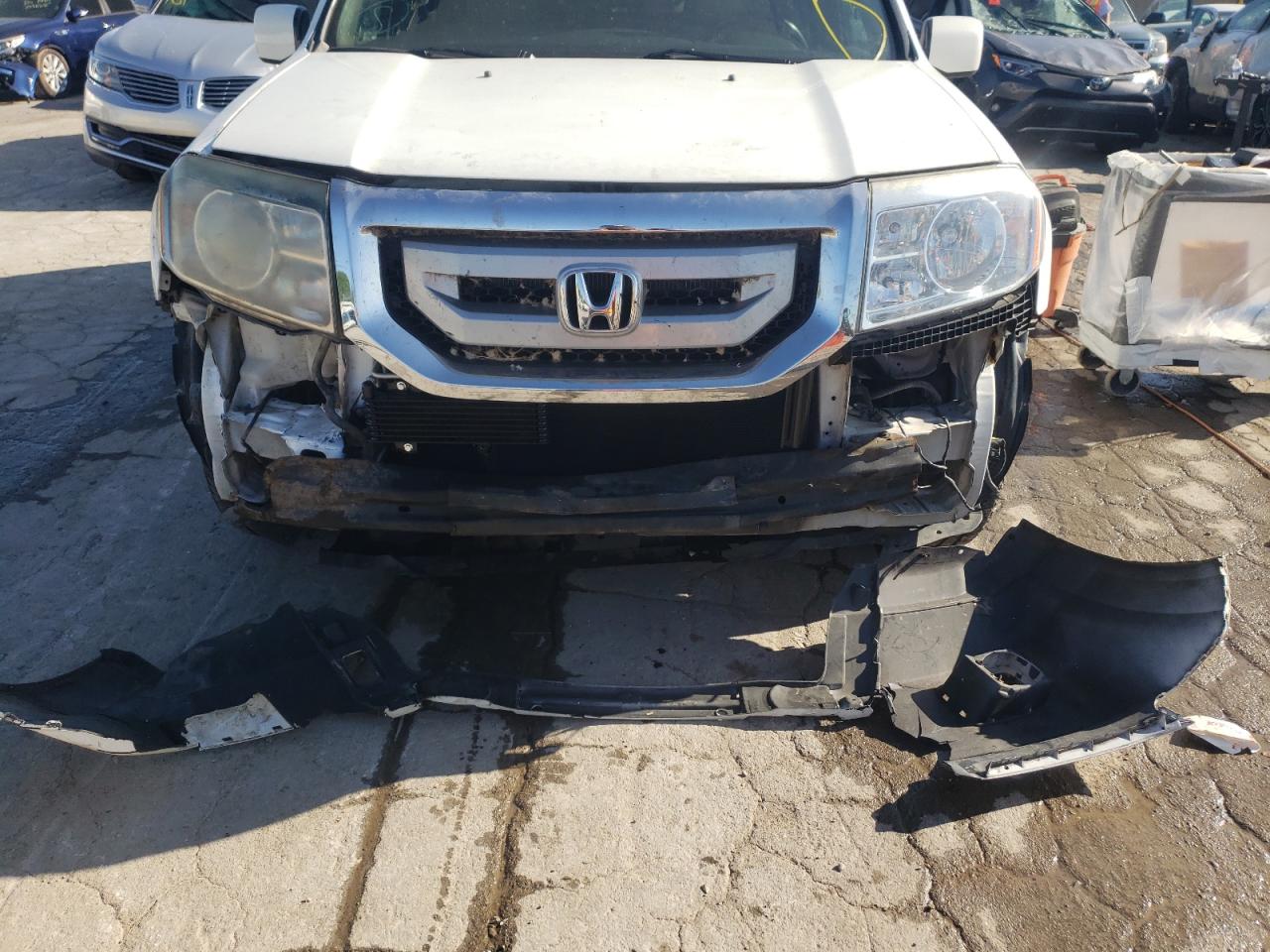 Photo 9 from auction – 2010 HONDA PILOT EXL with VIN 5FNYF3H67AB021507