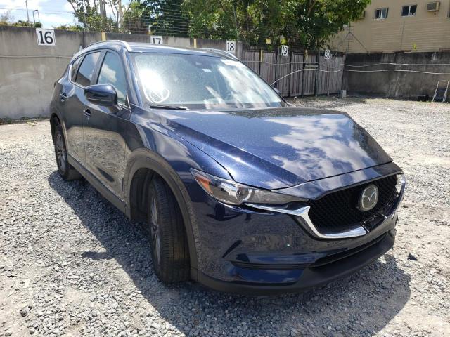 MAZDA CX-5 TOURI 2019 with VIN JM3KFACM1K0614058 - Photo from auction