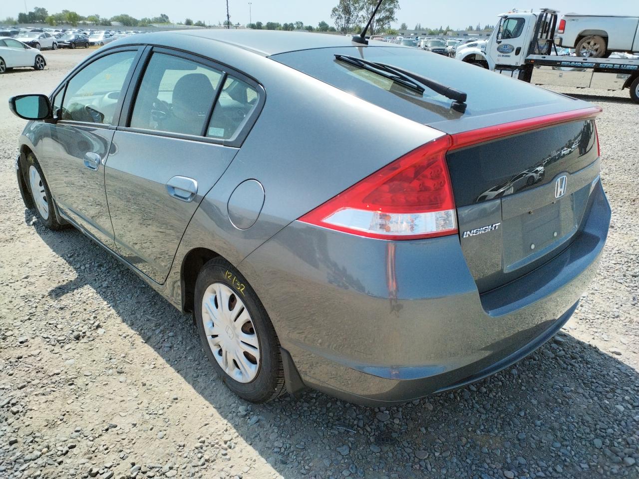 Photo 3 from auction – 2011 HONDA INSIGHT LX with VIN JHMZE2H56BS002586