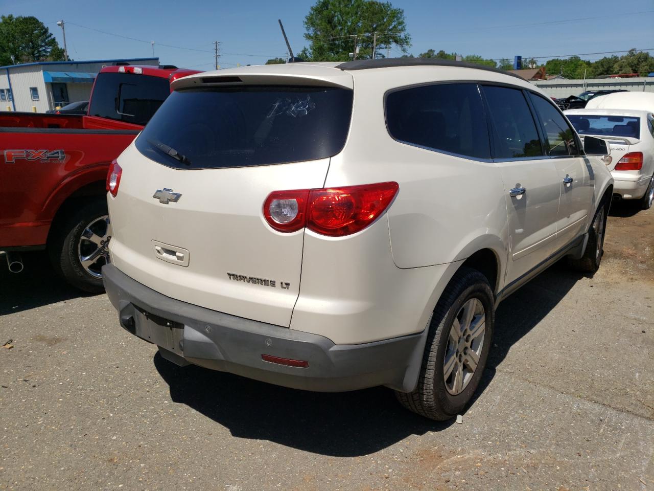 Photo 4 from auction – 2011 CHEVROLET TRAVERSE L with VIN 1GNKRGED3BJ157223